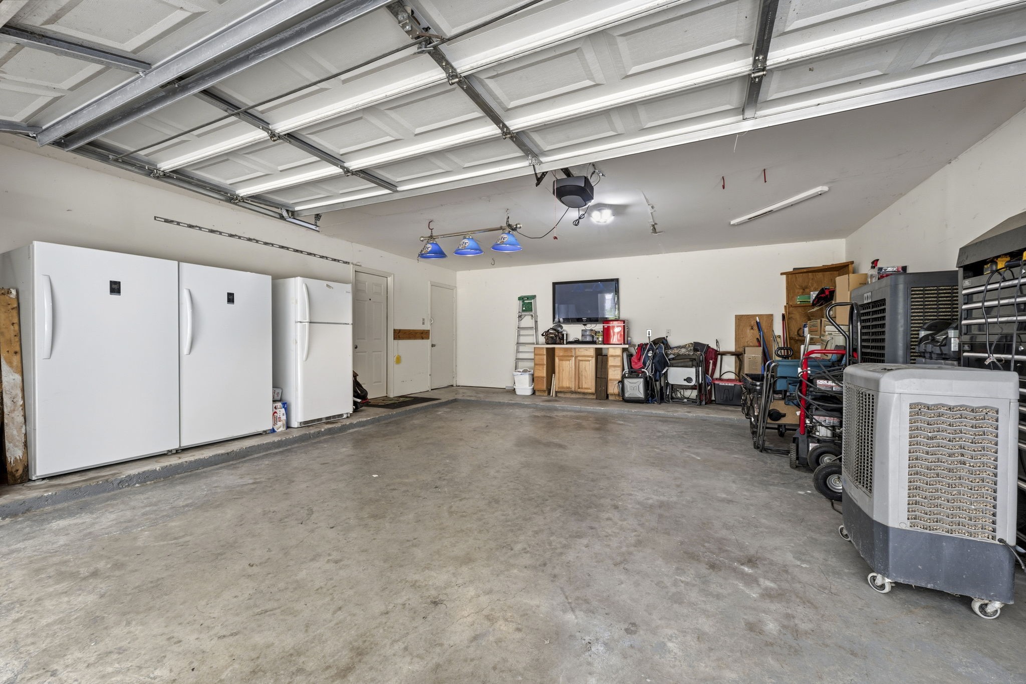 21809 Tophill Drive Spring, TX 77388 - Photo 35 of 50 a view of a empty room with storage
