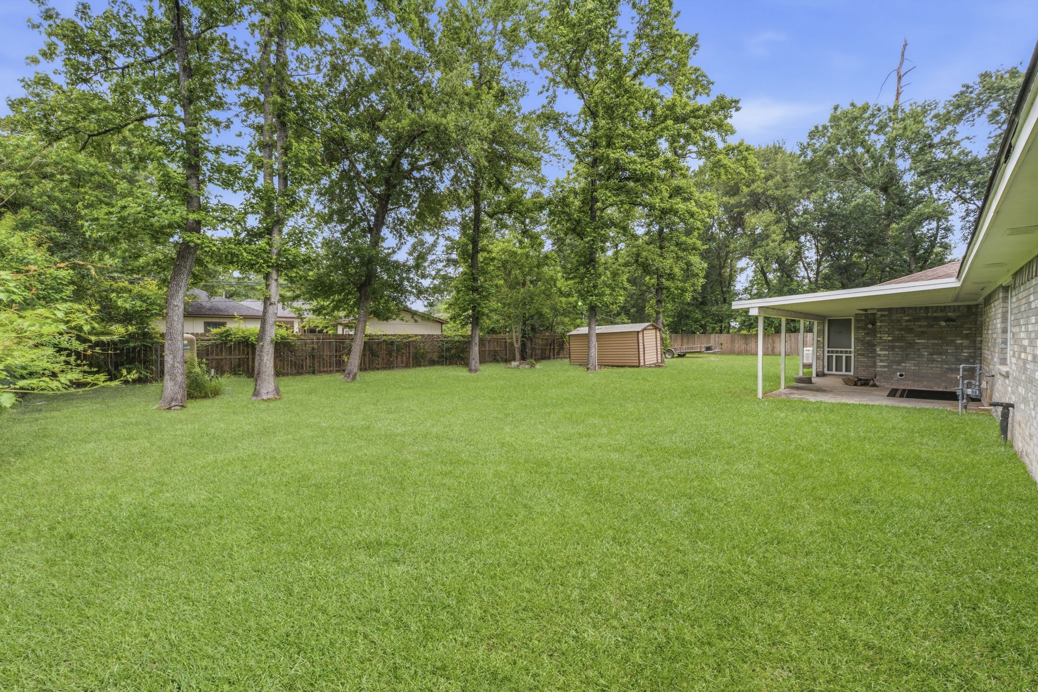 21809 Tophill Drive Spring, TX 77388 - Photo 37 of 50 a view of a house with a backyard