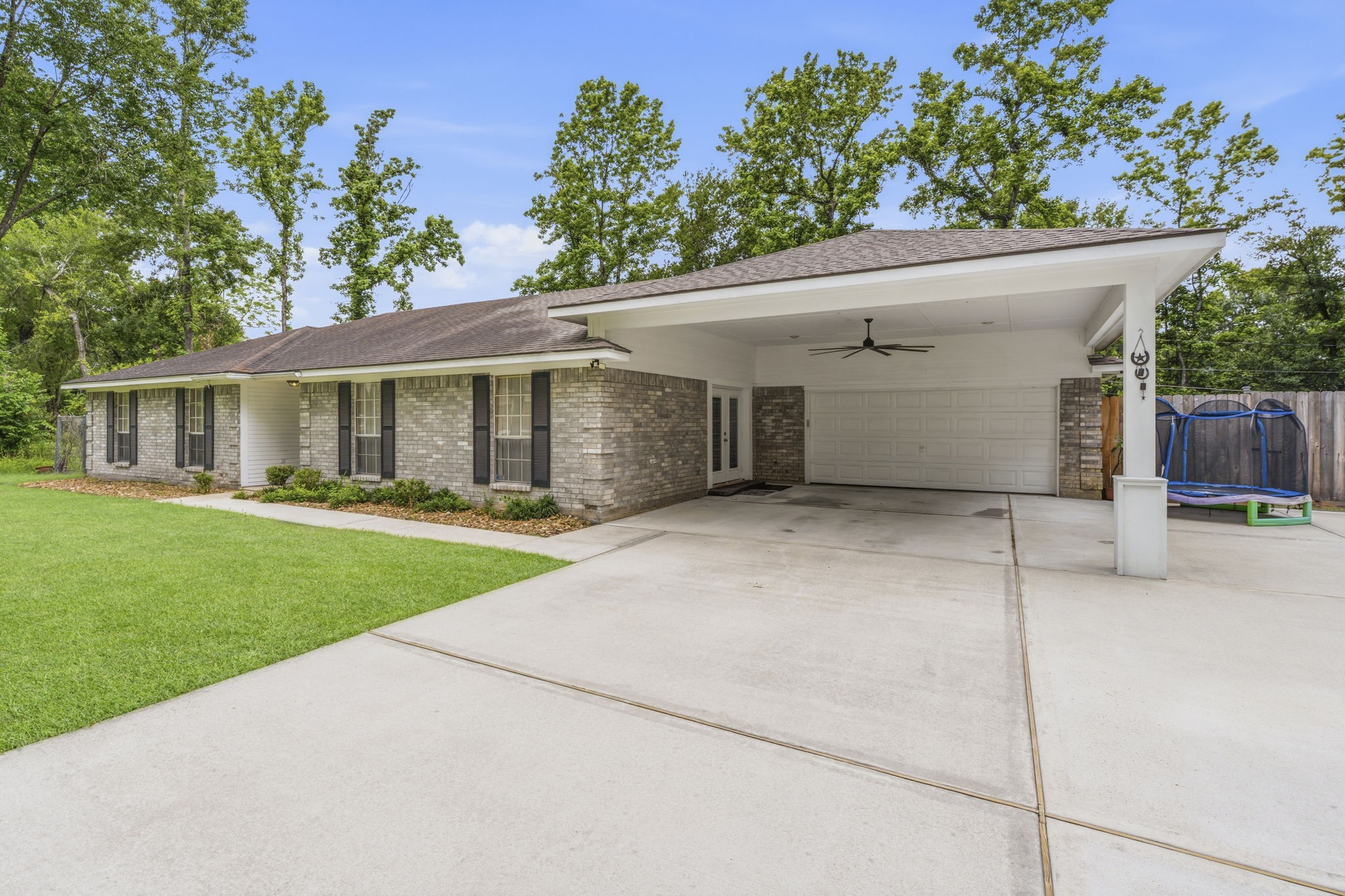 21809 Tophill Drive Spring, TX 77388 - Photo 3 of 50 a view of house with a yard and potted plants