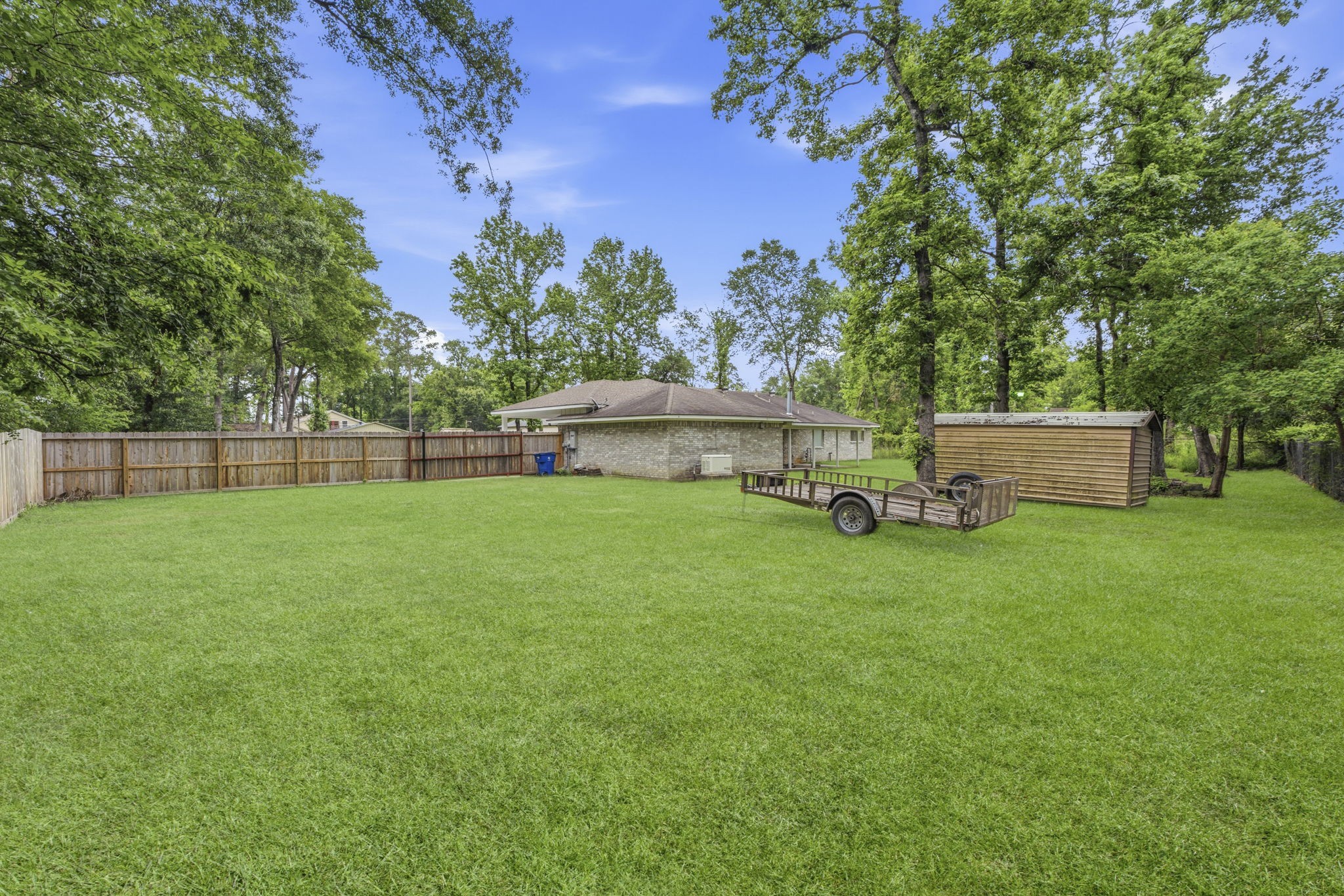 21809 Tophill Drive Spring, TX 77388 - Photo 38 of 50 a house view with a garden space