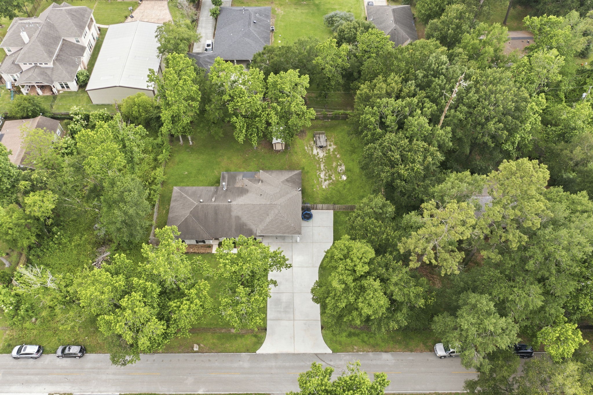 21809 Tophill Drive Spring, TX 77388 - Photo 40 of 50 an aerial view of a house with a yard and lake view
