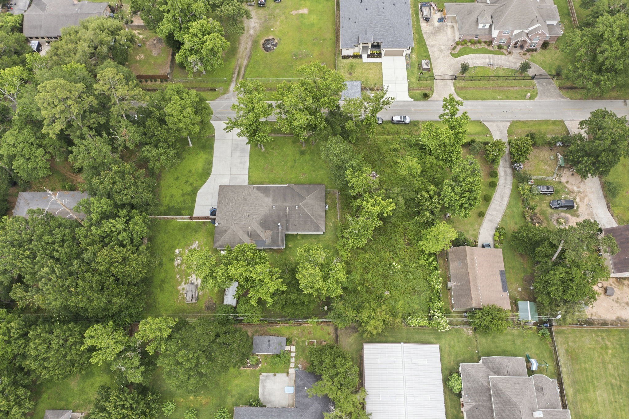 21809 Tophill Drive Spring, TX 77388 - Photo 41 of 50 an aerial view of a house with outdoor space and lake view