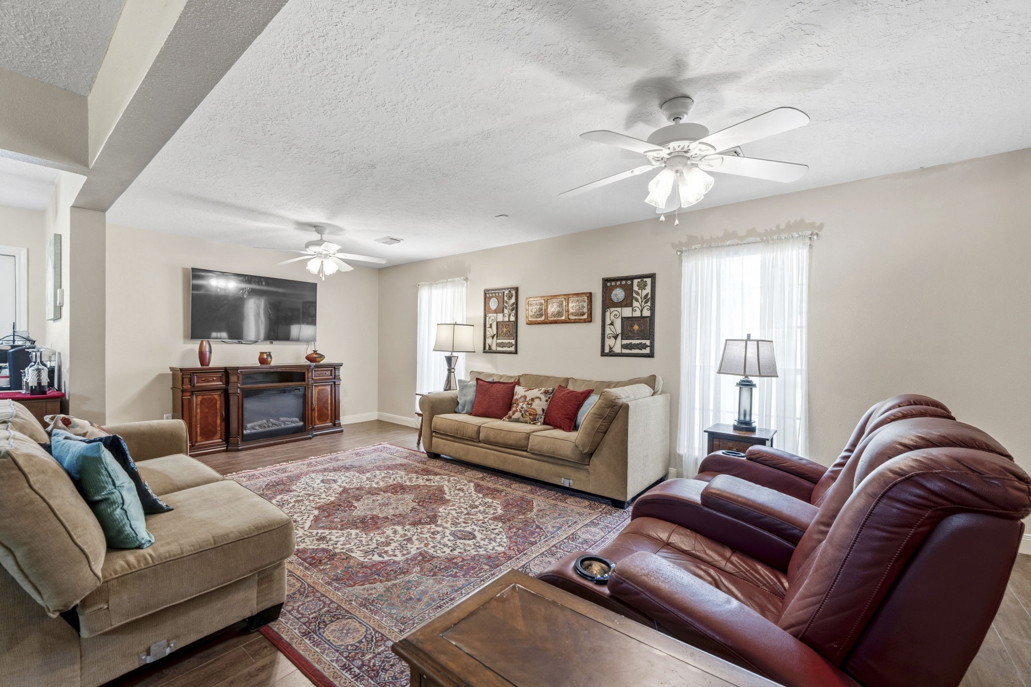 21809 Tophill Drive Spring, TX 77388 - Photo 7 of 50 a living room with furniture or couch and a chandelier