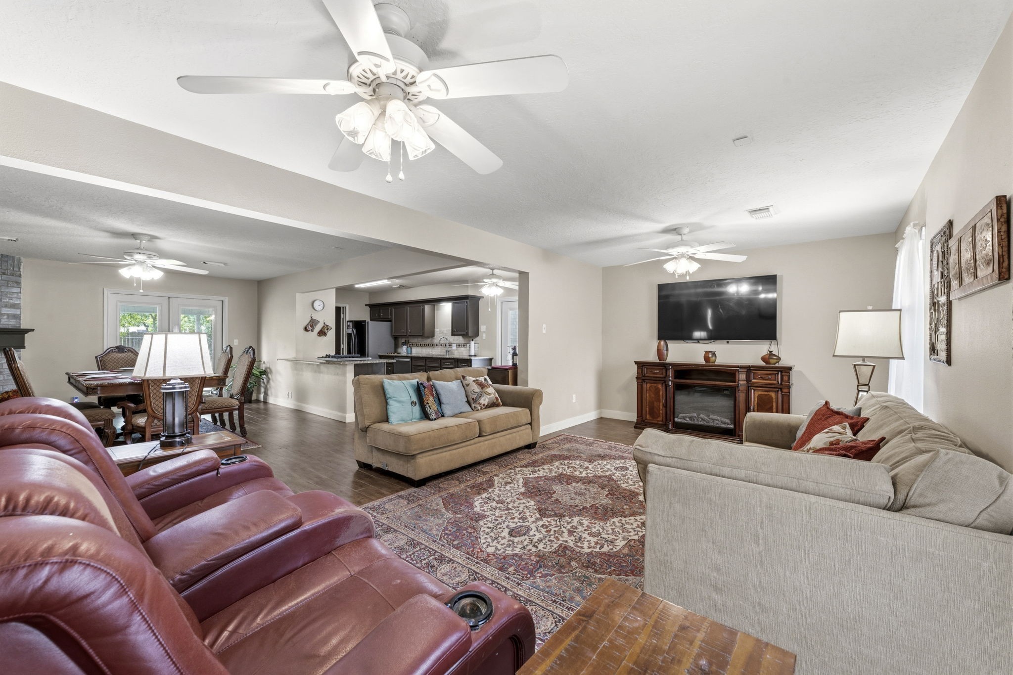 21809 Tophill Drive Spring, TX 77388 - Photo 49 of 50 a living room with furniture and a flat screen tv