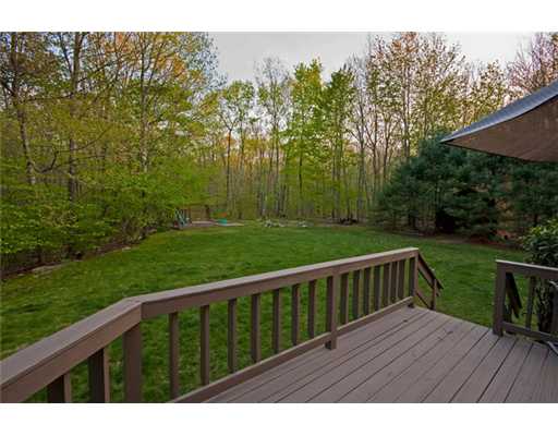 723 Whaley Hollow Road Coventry, RI 02816 - Photo 4 of 12 Patio/Deck. View of big back yard from deck.