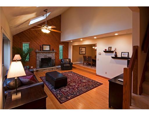 723 Whaley Hollow Road Coventry, RI 02816 - Photo 8 of 12 Den/Family/Great Room. Family room with stone fireplace.