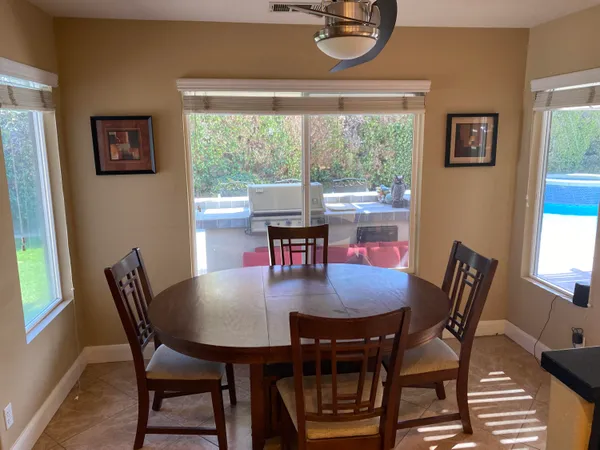 a workspace with furniture and a window