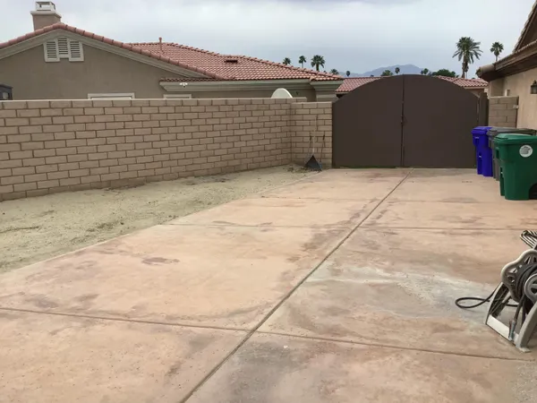 a metallic refrigerator freezer sitting in a kitchen