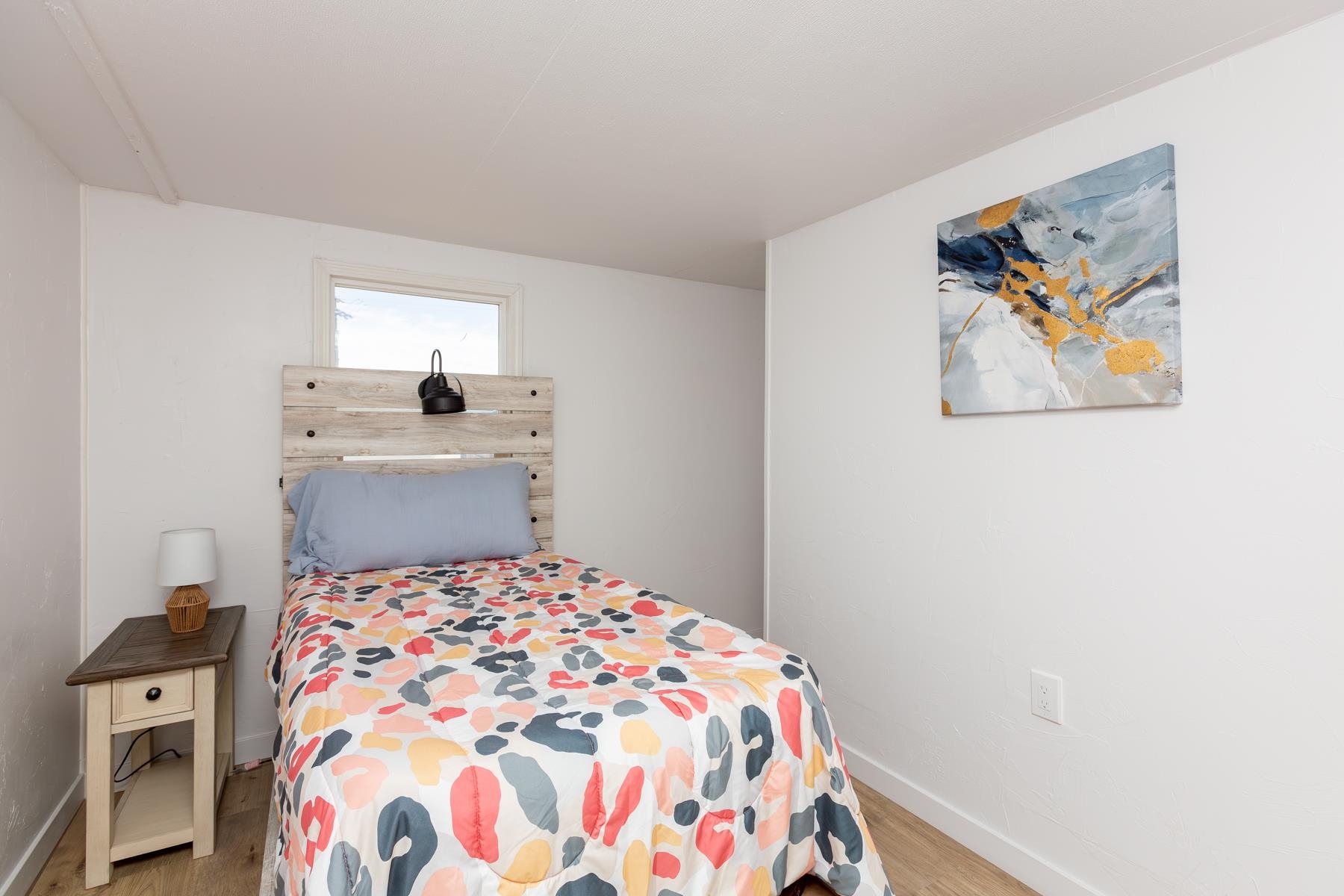 424 32 Road, Unit 112 Clifton, CO 81520 - Photo 16 of 41 a bedroom with a bed and cabinets