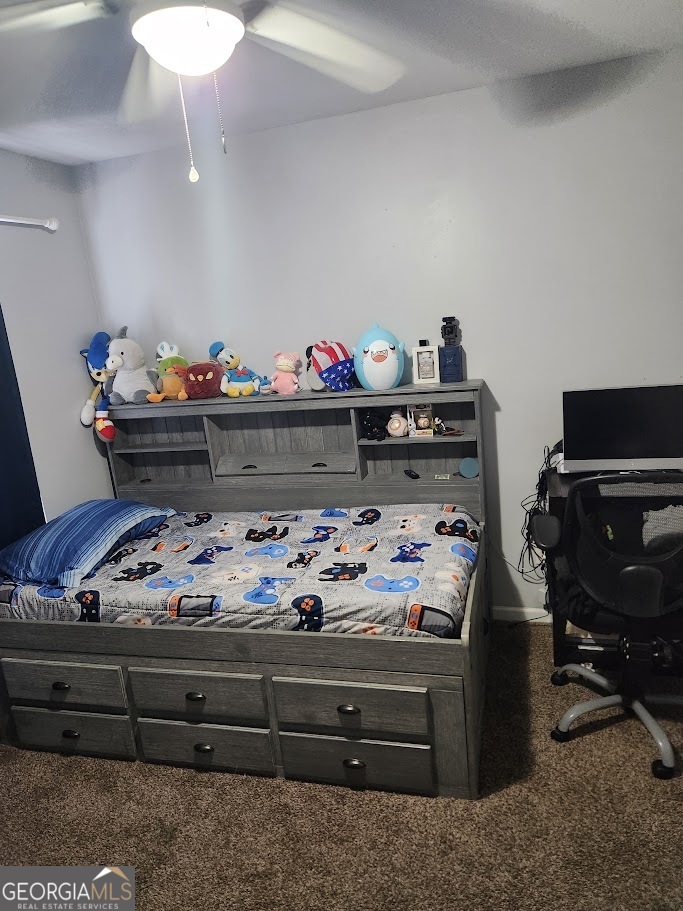 49 Preserve Drive Newnan, GA 30263 - Photo 11 of 17 a bed room with a bed and a fish tank