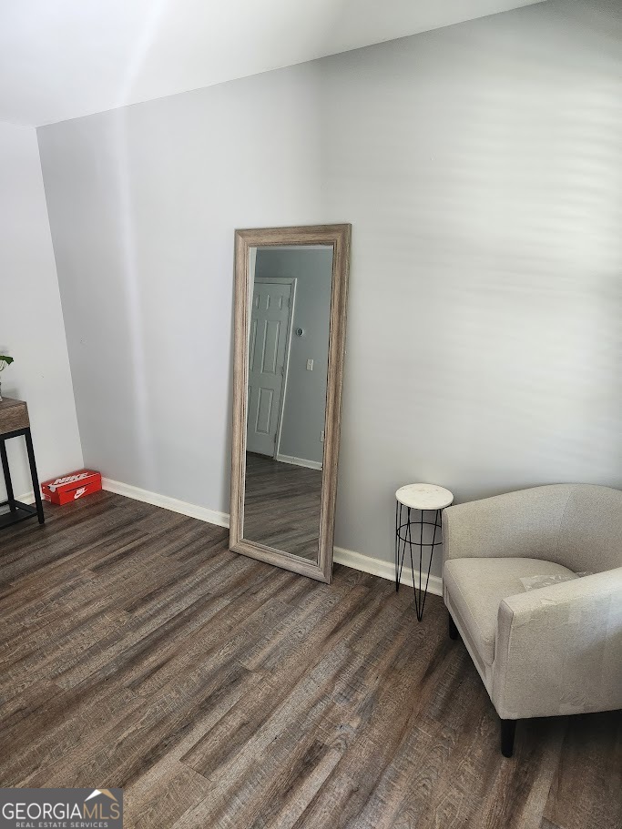49 Preserve Drive Newnan, GA 30263 - Photo 2 of 17 a living room with furniture and a wooden floor