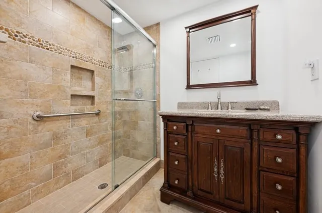 a couple of palm trees and a lake view