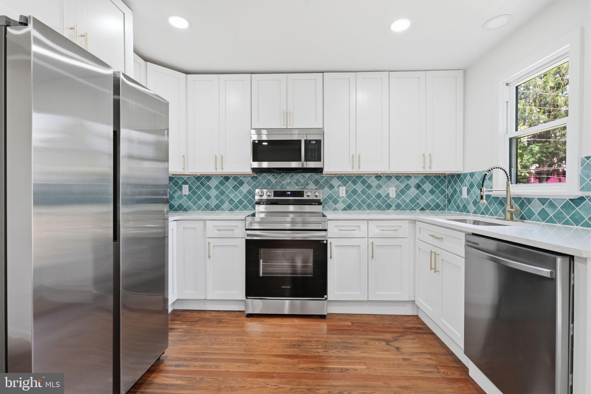 124 Cedar Road Riegelsville, PA 18077 - Photo 16 of 50 Modern kitchen with stylish accents.
