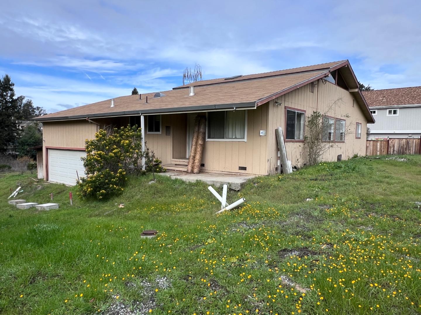 6125 Abbey Road Aptos, CA 95003 - Photo 2 of 7 a house view with a garden space