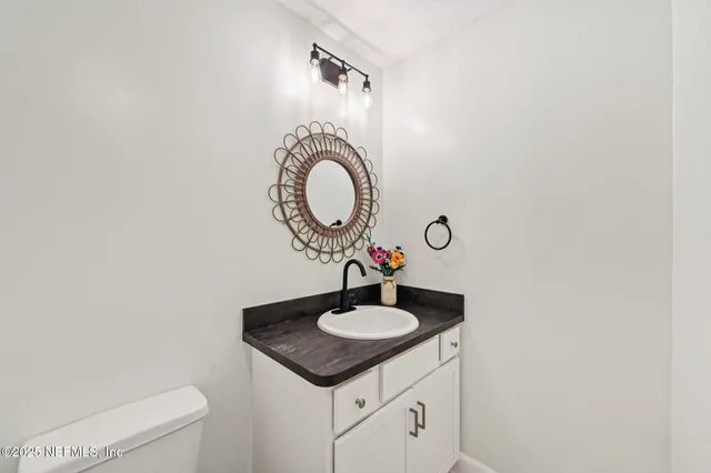 a sink with a mirror