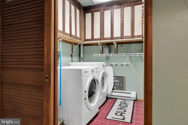 a bedroom with a bed closet and a walk in closet