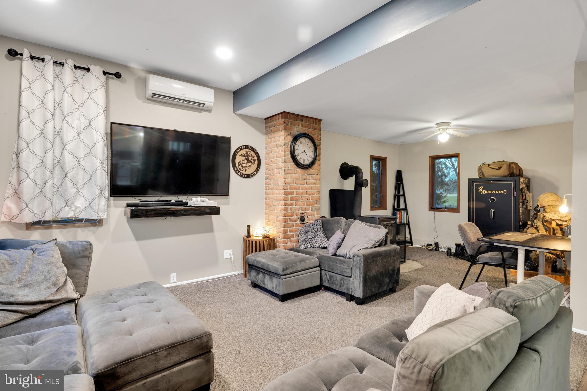 111 Kohler Road Kutztown, PA 19530 - Photo 6 of 19 a living room with furniture and a flat screen tv
