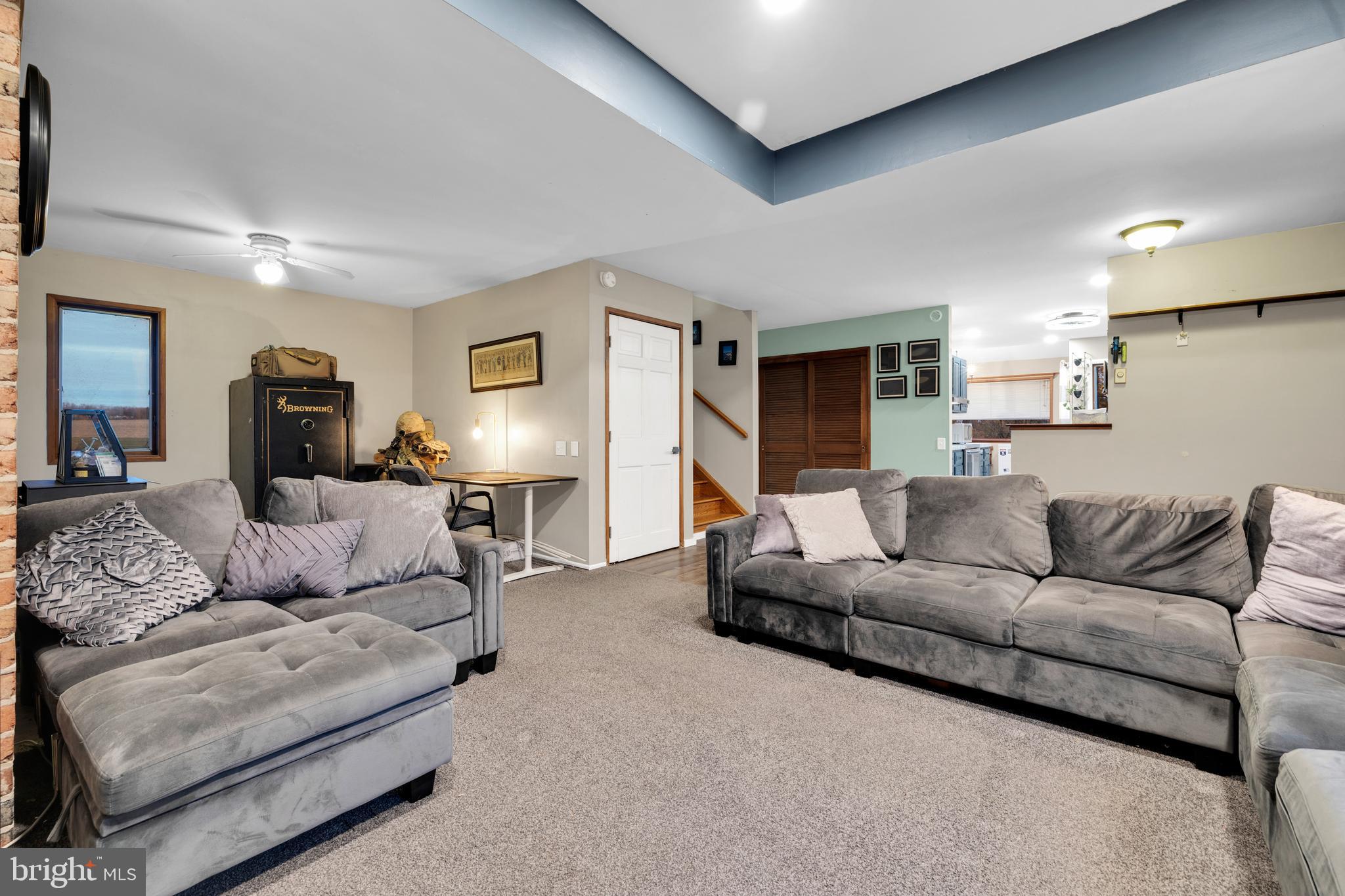111 Kohler Road Kutztown, PA 19530 - Photo 7 of 19 a living room with furniture and a lamp