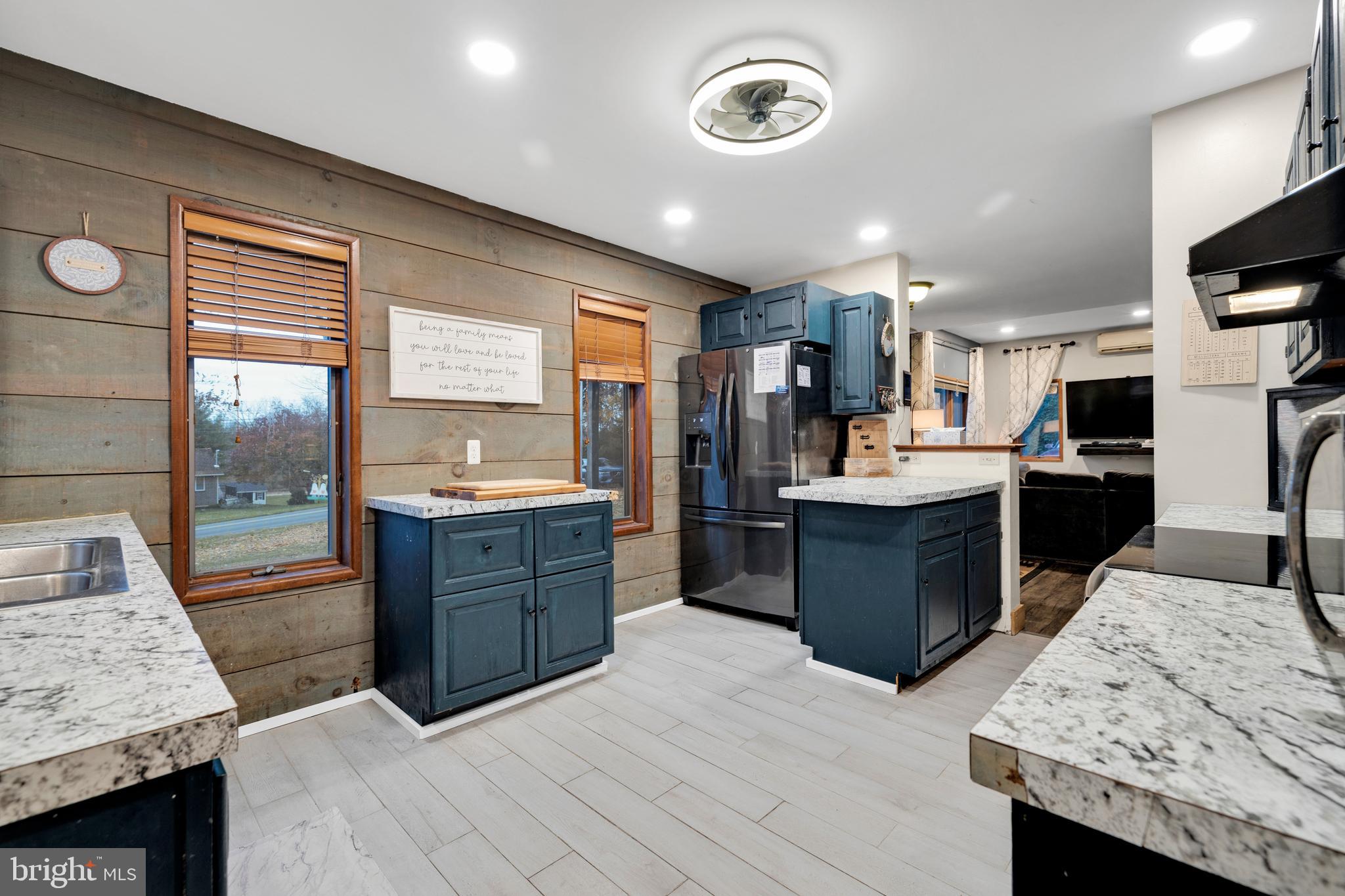111 Kohler Road Kutztown, PA 19530 - Photo 10 of 19 a large kitchen with a large counter top appliances and cabinets