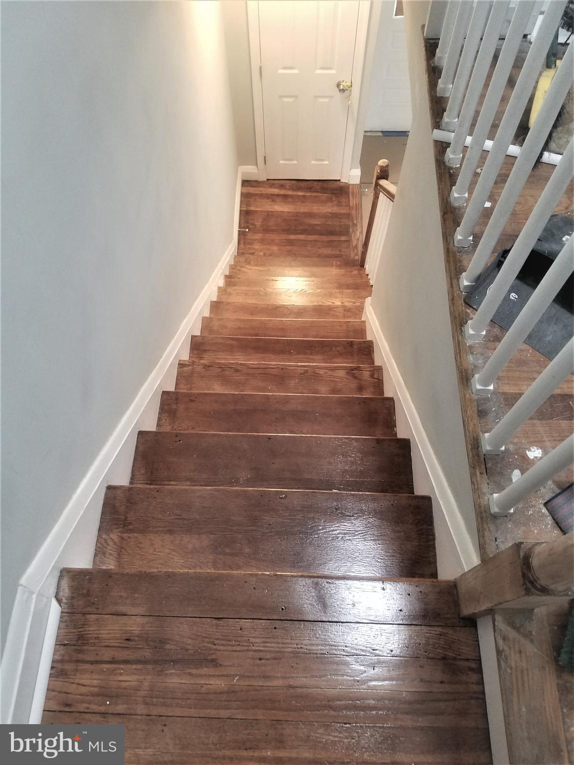 1529 Stonewood Road Baltimore, MD 21239 - Photo 8 of 21 Refinished stairs