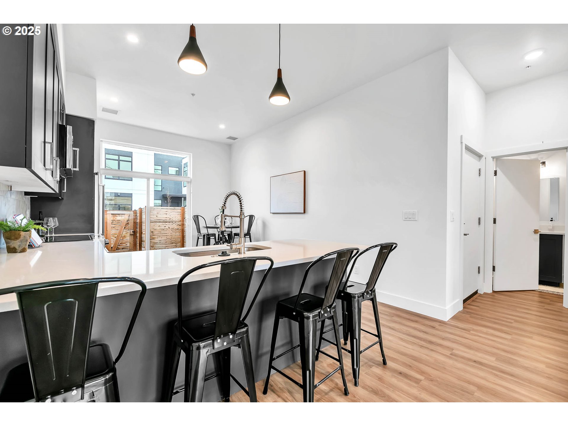 177 East 20th Avenue Eugene, OR 97405 - Photo 12 of 45 a view of a dining room with furniture and wooden floor