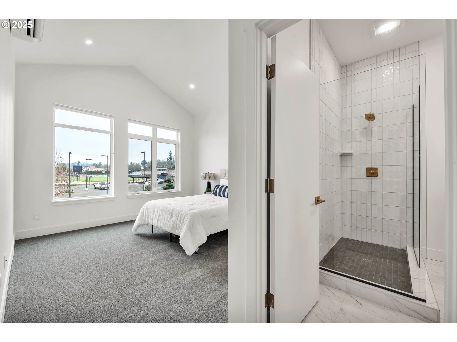 177 East 20th Avenue Eugene, OR 97405 - Photo 22 of 45 a spacious bedroom with a bed and a window