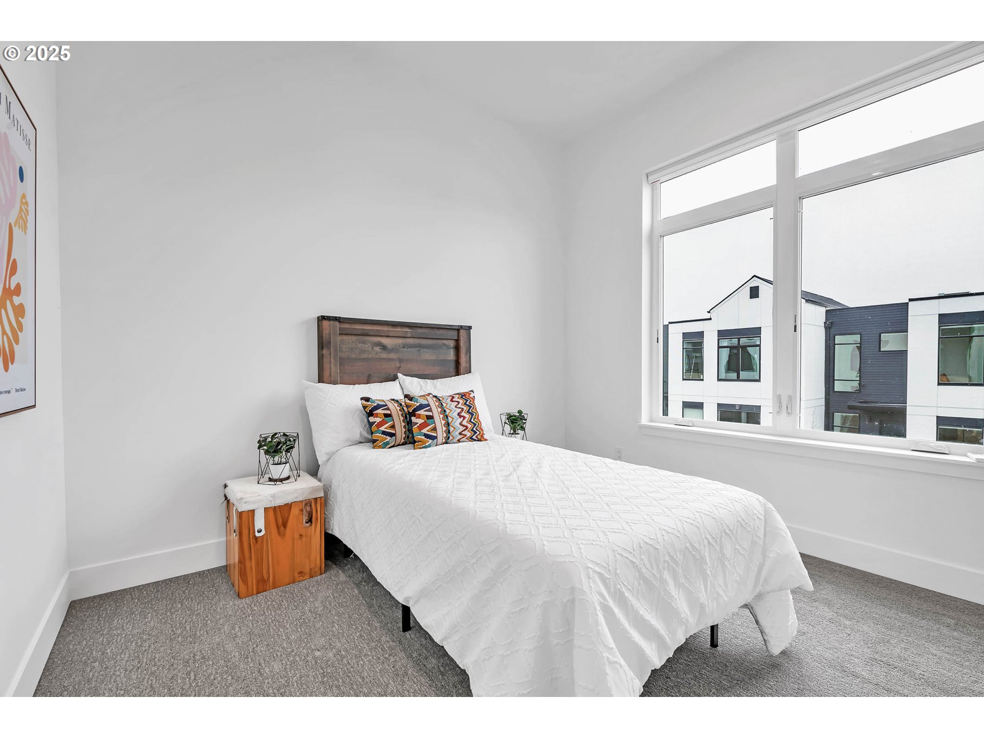177 East 20th Avenue Eugene, OR 97405 - Photo 32 of 45 a bedroom with a bed and a large window