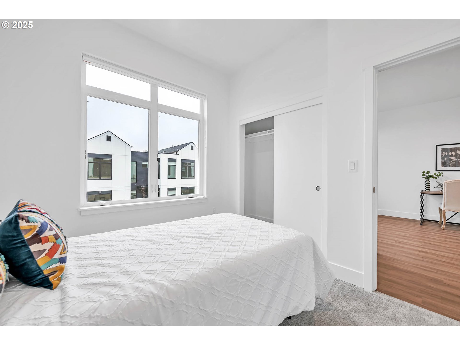 177 East 20th Avenue Eugene, OR 97405 - Photo 33 of 45 a bedroom with a bed and a large window