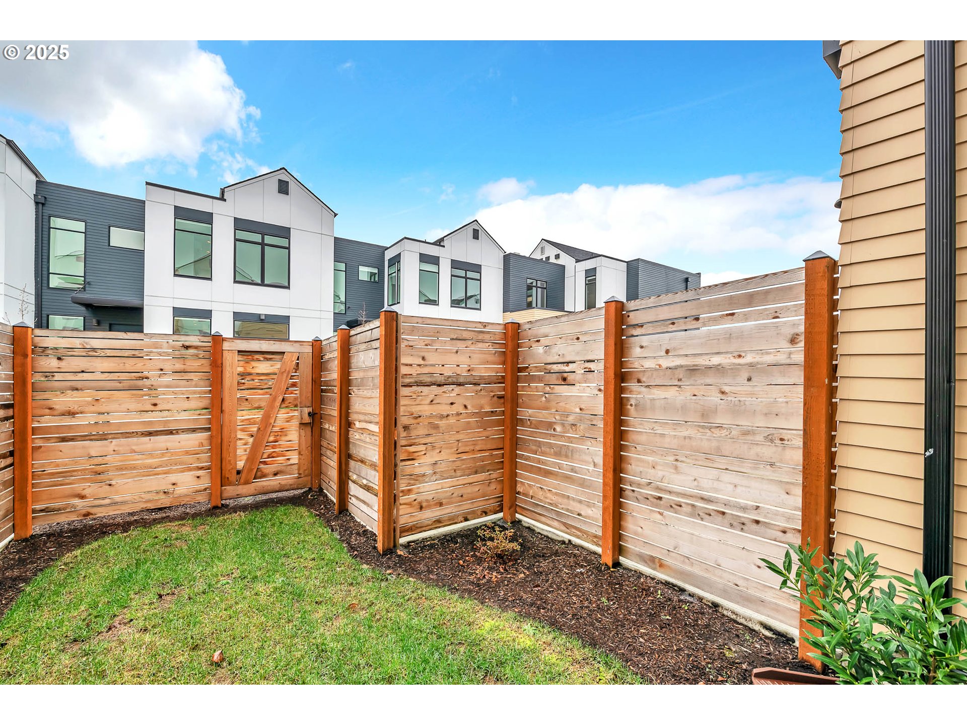 177 East 20th Avenue Eugene, OR 97405 - Photo 38 of 45 a view of a brick house with a large door