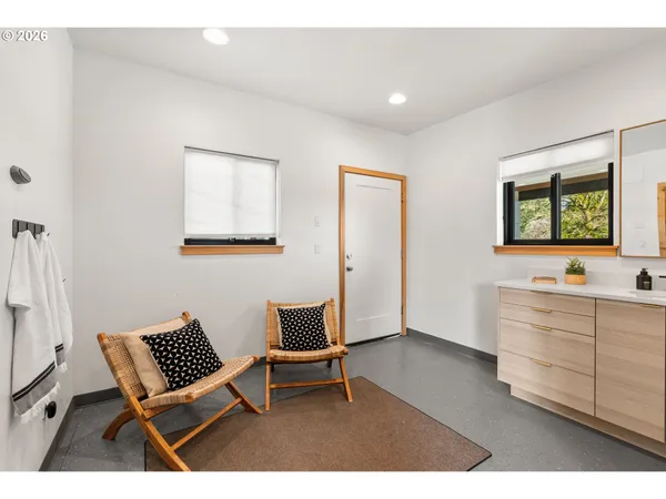a view of room with window and furniture