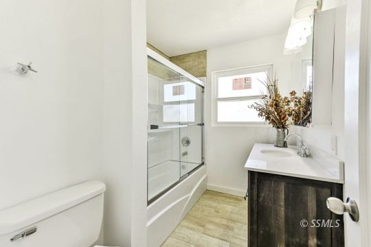 329 North Balsam Street Ridgecrest, CA 93555 - Photo 22 of 27 a bathroom with a sink toilet and shower