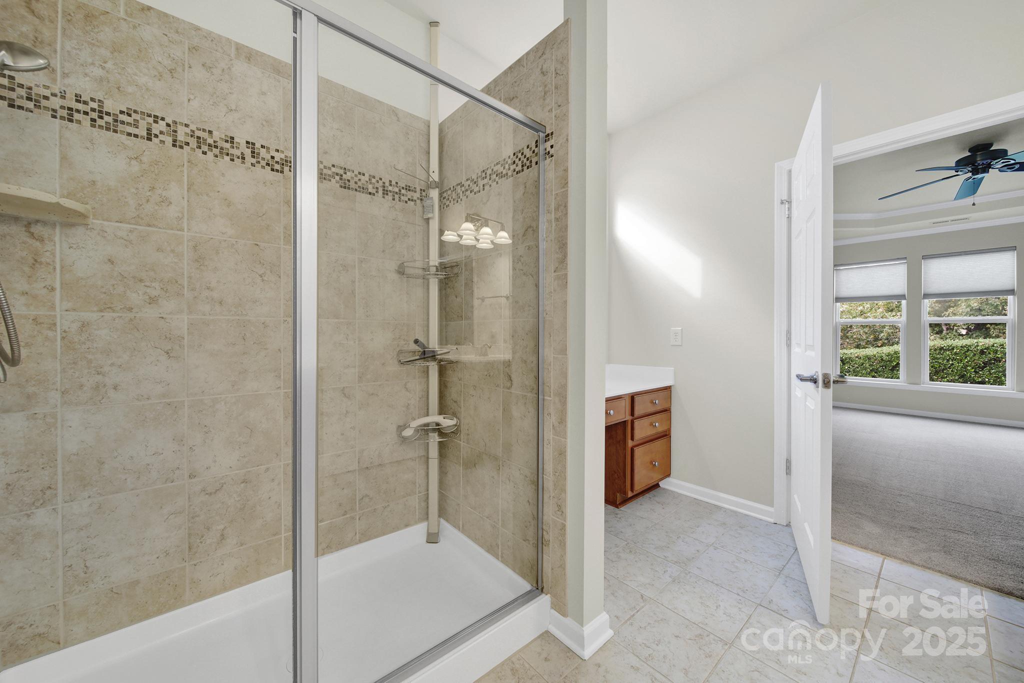 2034 Moultrie Court Fort Mill, SC 29707 - Photo 21 of 46 a bathroom with a shower and a tub