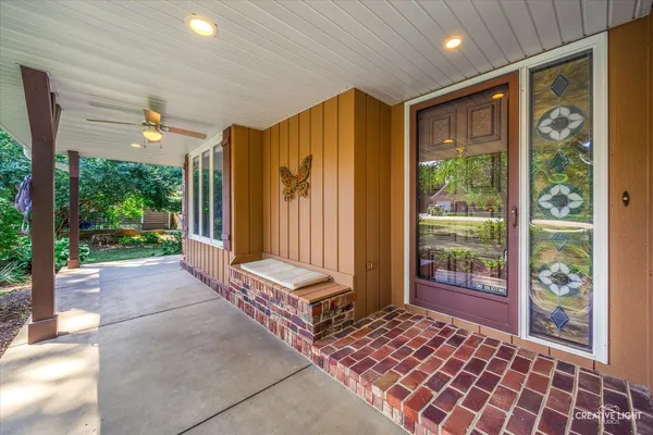 a view of deck with wooden floor and seating space