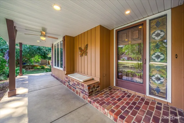 a view of deck with wooden floor and seating space