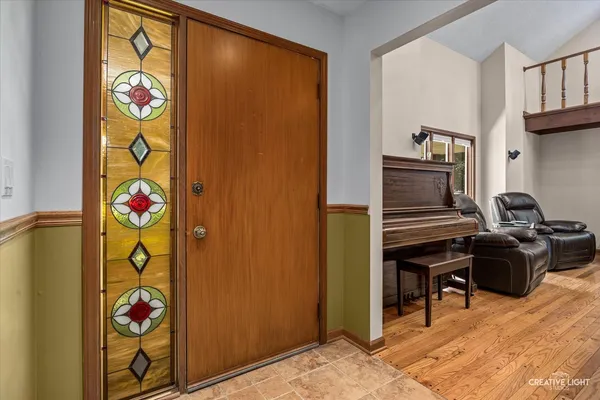 a living room with furniture windows and a fireplace
