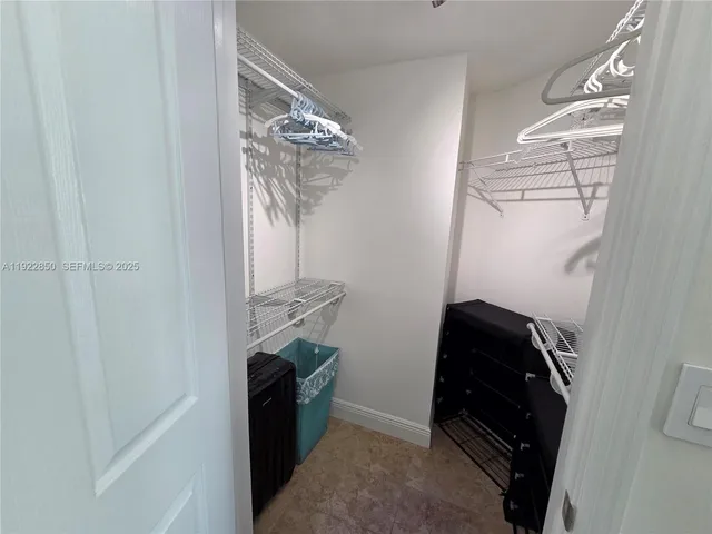 a bathroom with a toilet sink and a shower