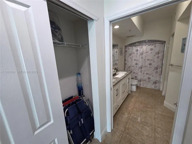 a bathroom with a tub and a shower
