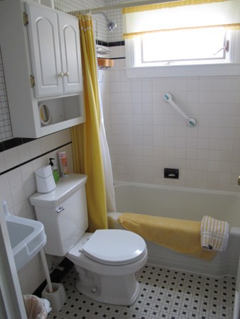 27 Nevada Road Needham, MA 02494 - Photo 6 of 14 a bathroom with a toilet and a shower