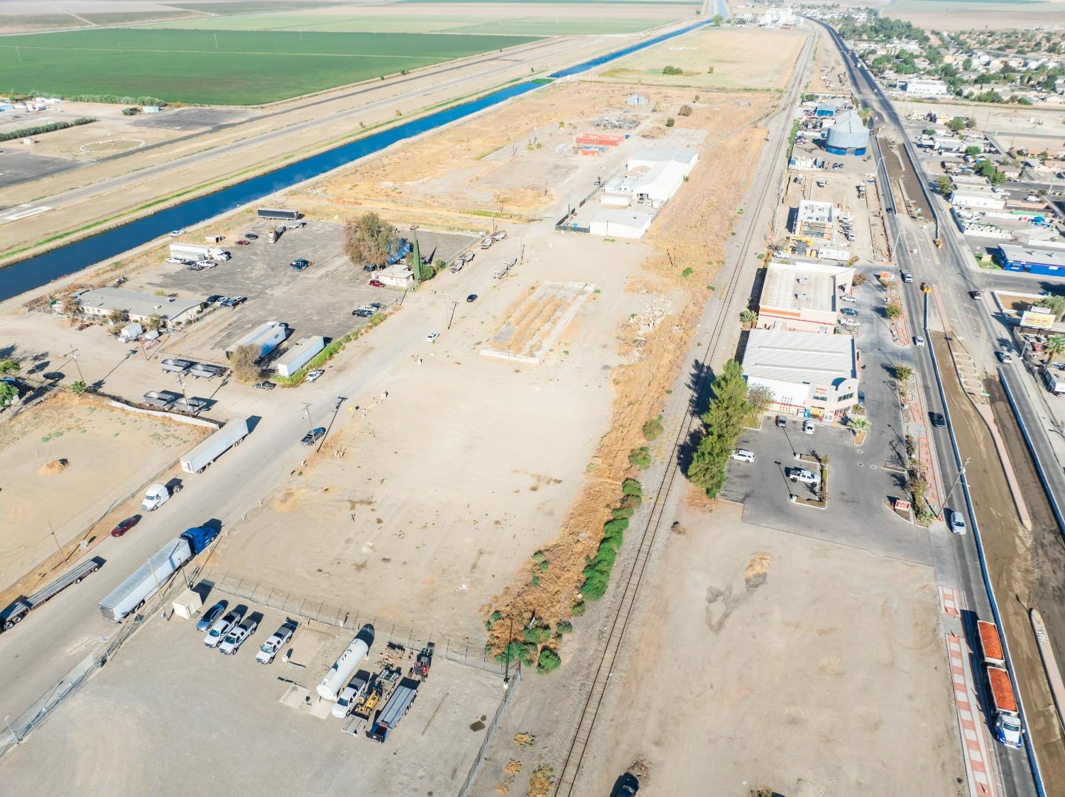 1047 M Street Firebaugh, CA 93622 - Photo 10 of 14 an aerial view of a swimming pool