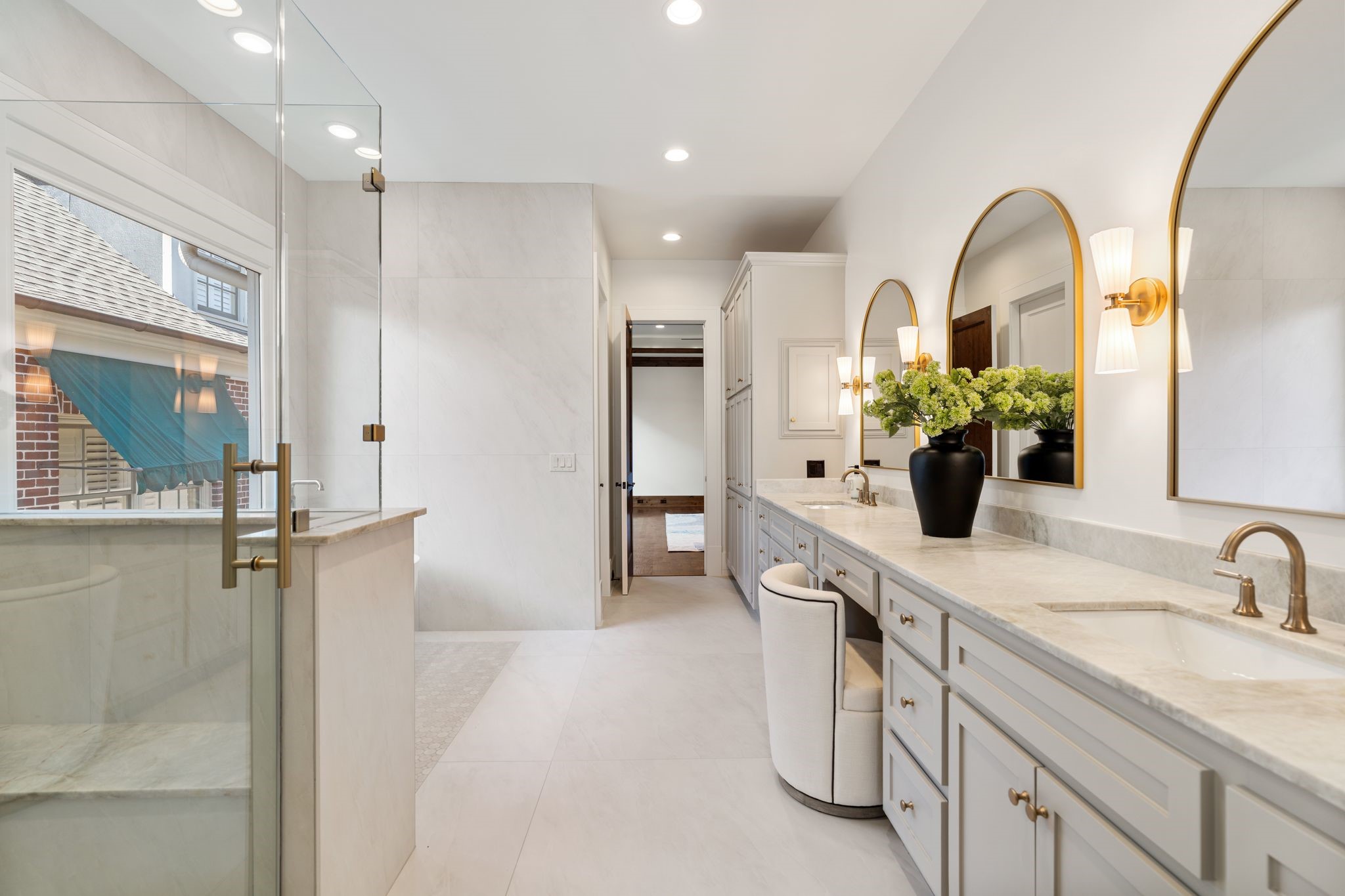 1815 Milford Street Houston, TX 77098 - Photo 15 of 33 BATHROOM III - Bathroom features stone flooring and shower surround.