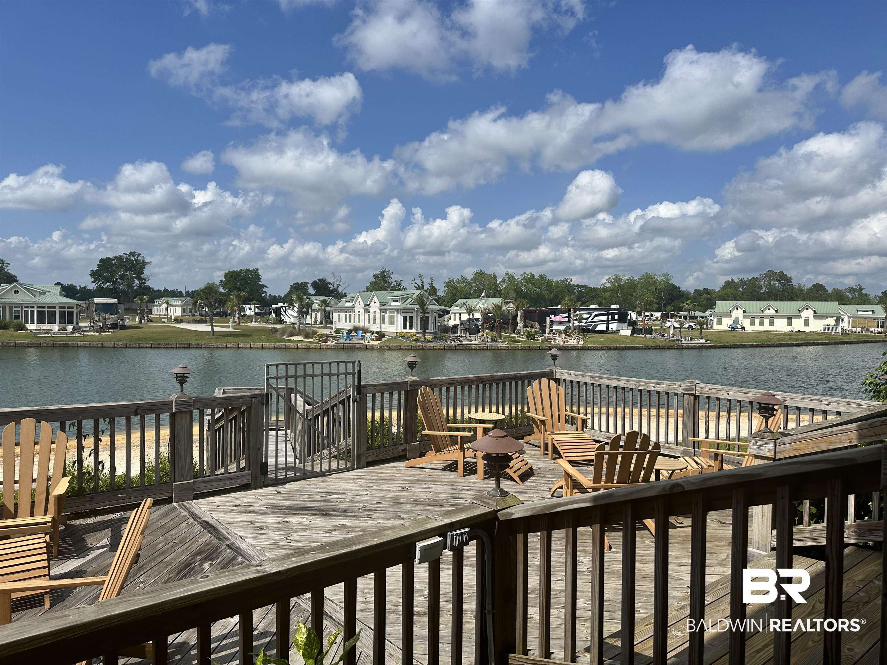 12277 Gateway Drive Elberta, AL 36530 - Photo 31 of 54 Deck featuring a water view and a residential view