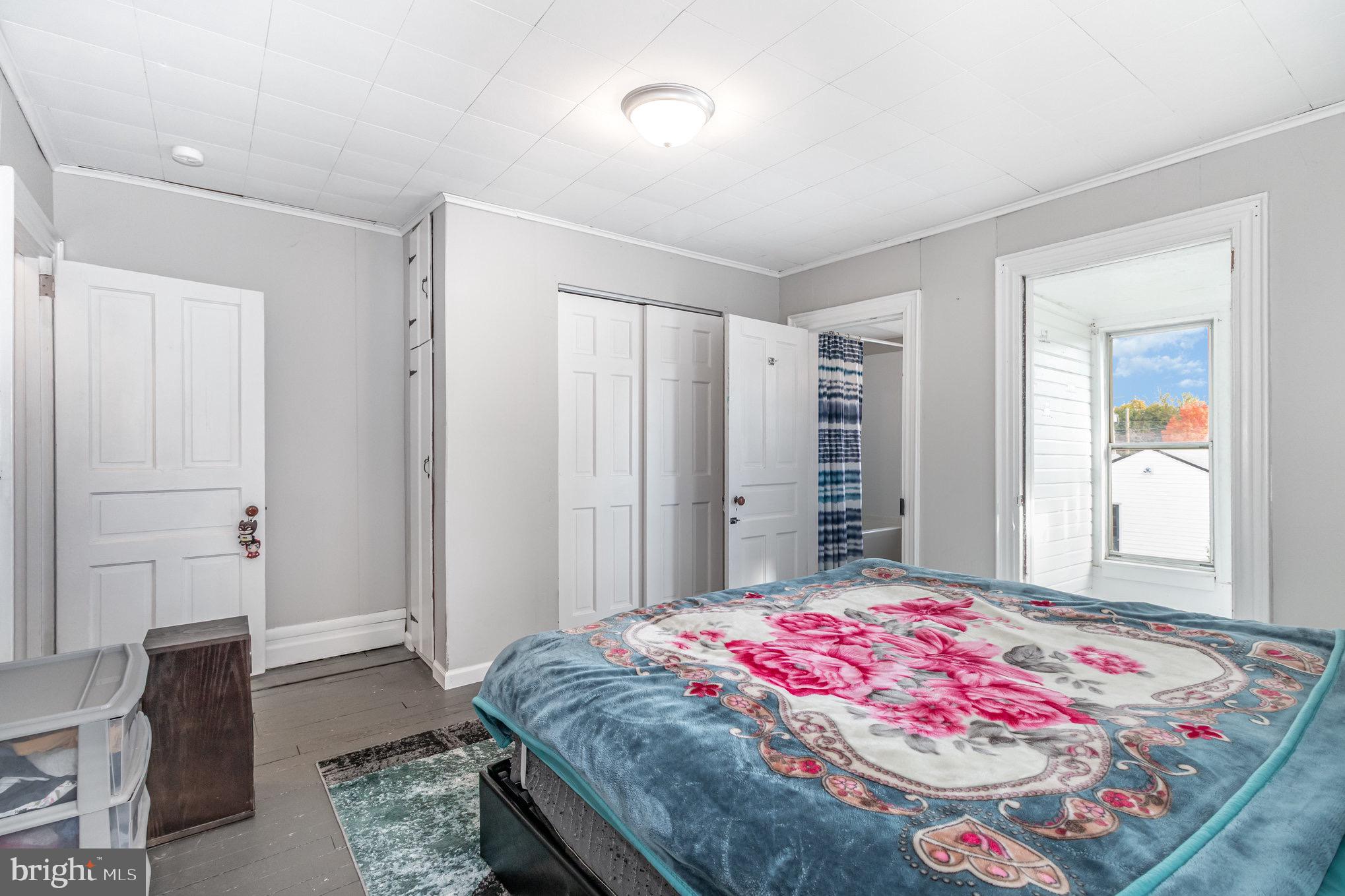 429 High Street Hanover, PA 17331 - Photo 15 of 25 a bedroom with a bed and a dresser