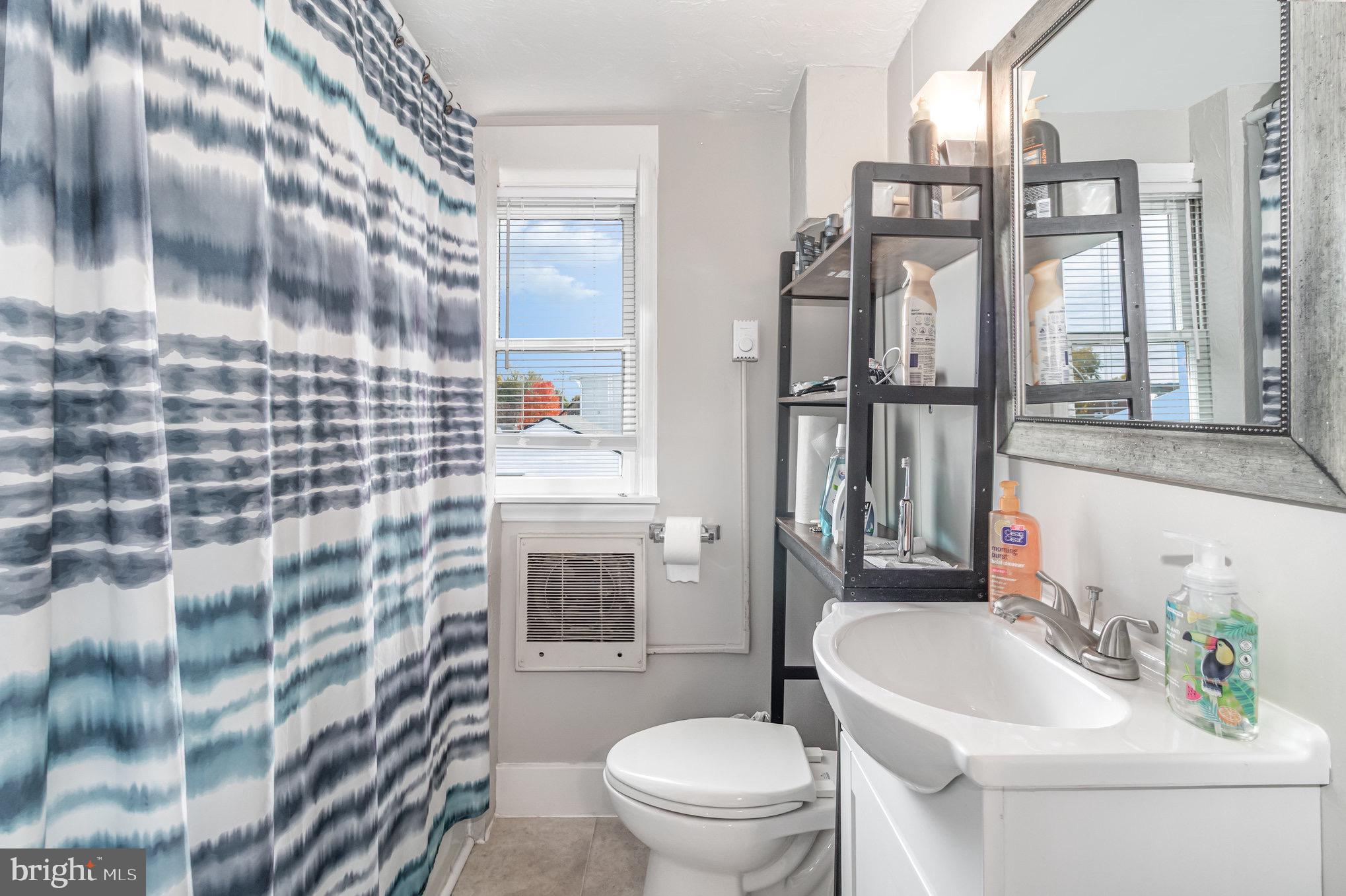 429 High Street Hanover, PA 17331 - Photo 16 of 25 a bathroom with a sink toilet and shower