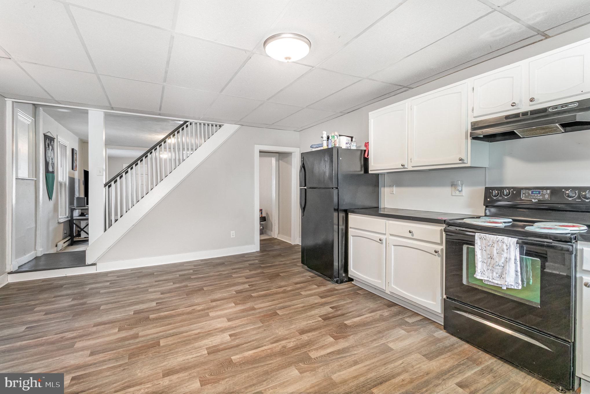 429 High Street Hanover, PA 17331 - Photo 4 of 25 a kitchen with stainless steel appliances granite countertop a refrigerator a stove and a sink