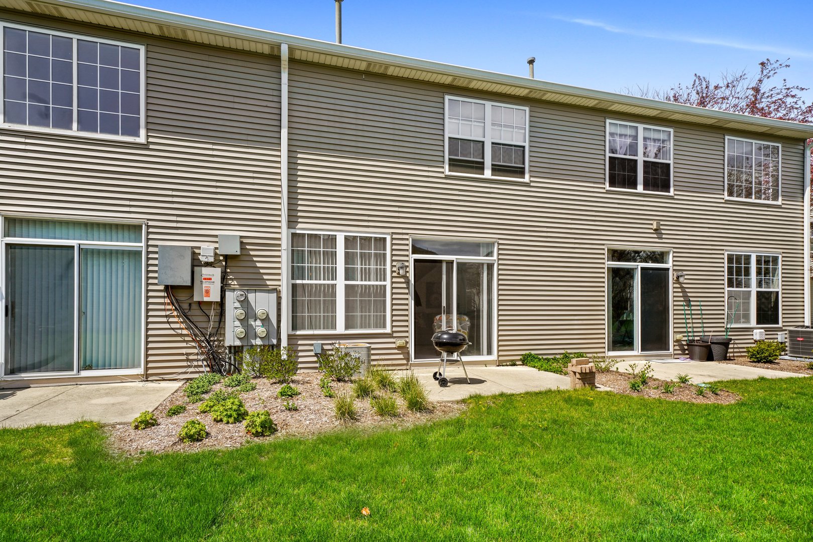 2406 Sheehan Drive Naperville, IL 60564 - Photo 16 of 17 a front view of a house with a yard
