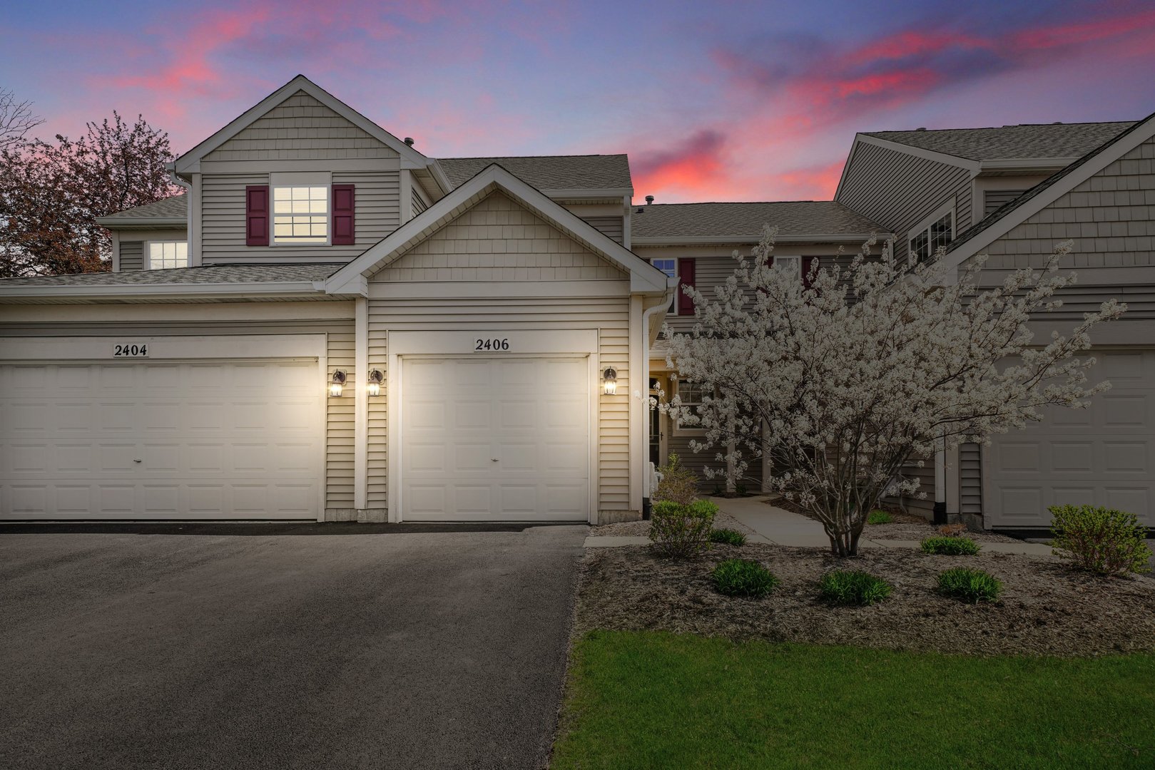 2406 Sheehan Drive Naperville, IL 60564 - Photo 17 of 17 a front view of a house with a yard and garage