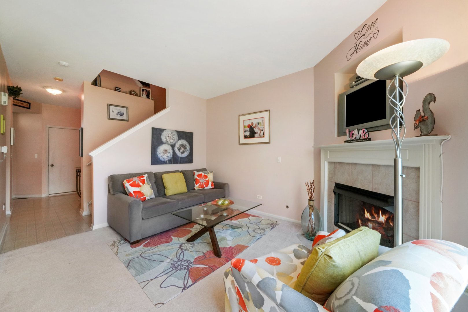 2406 Sheehan Drive Naperville, IL 60564 - Photo 4 of 17 a living room with furniture and a fireplace