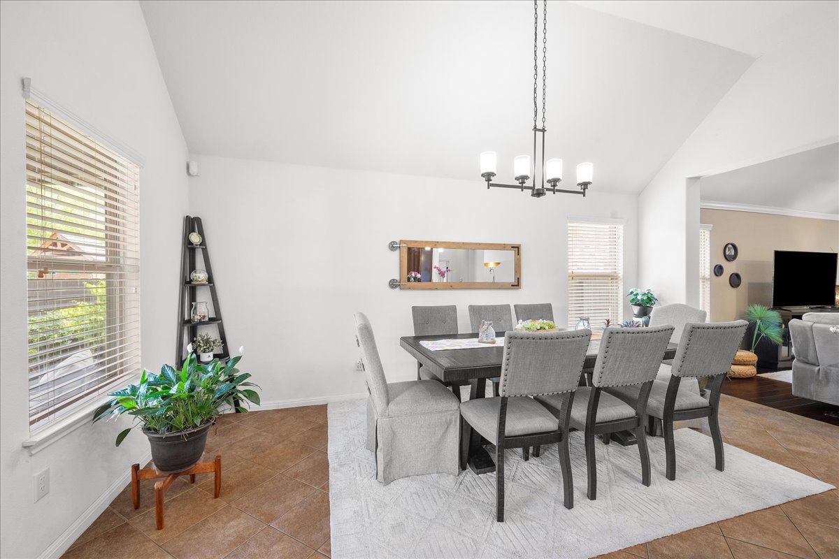 3000 Rio Verde Drive Leander, TX 78641 - Photo 6 of 23 a view of a dining room with furniture window and wooden floor