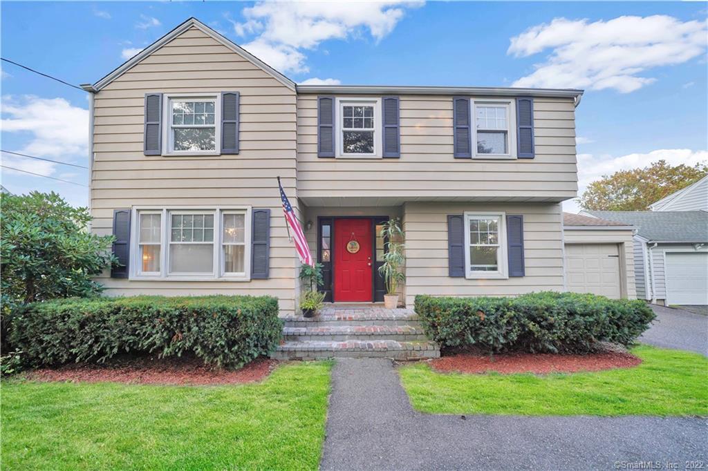 699 New Harwinton Road Torrington, CT 06790 - Photo 1 of 1 a front view of a house with a yard and porch