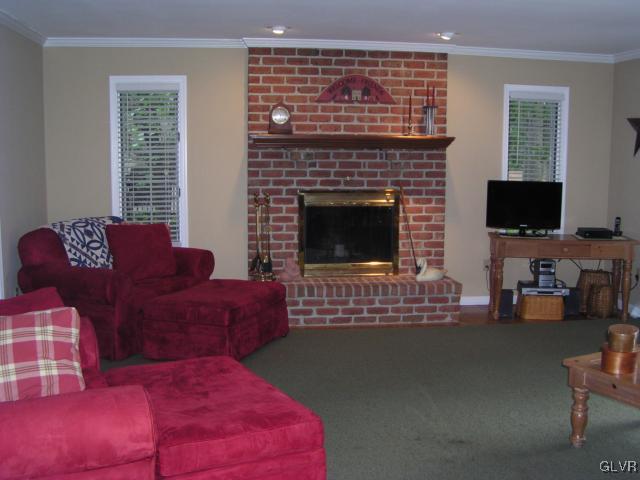 3545 Oakland Road Bethlehem, PA 18020 - Photo 22 of 49 Family room view from kitchen of brick fireplace.